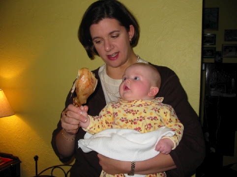 Jane enjoying her first drumstick with help from Bethany